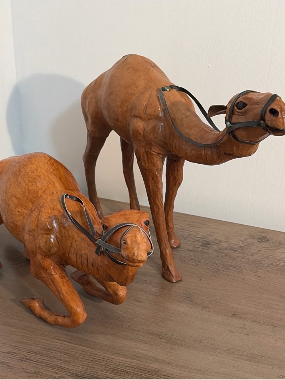 Pair of vintage 12 inch leather-wrapped camel figurines